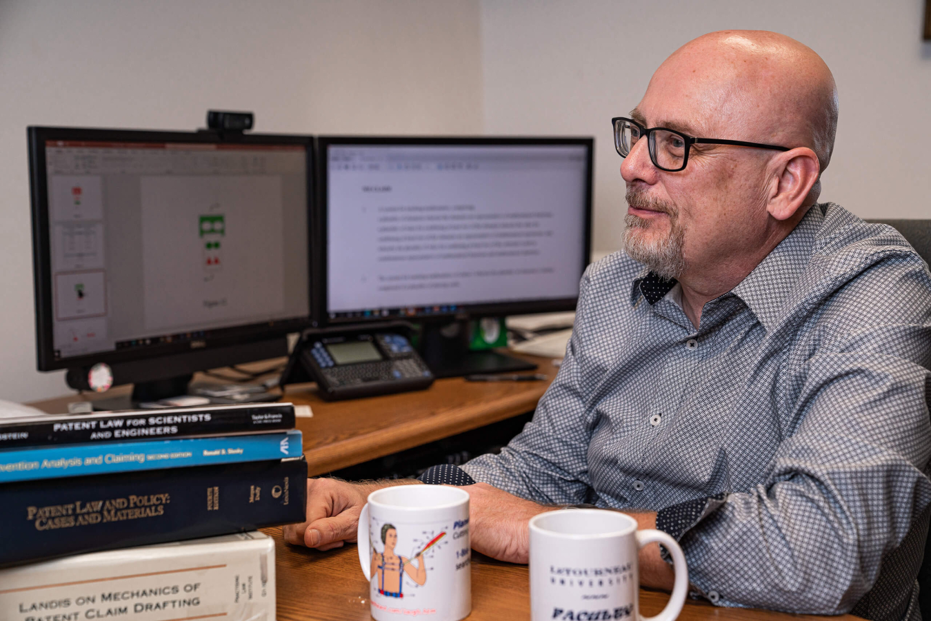 Gary DeBoer sitting at a desk. 