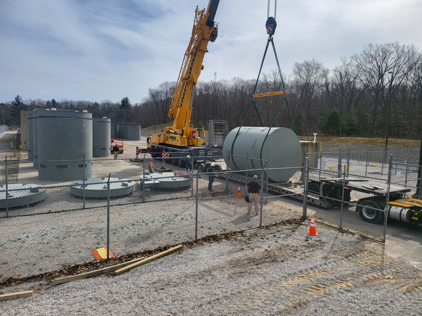 tank lifted by crane