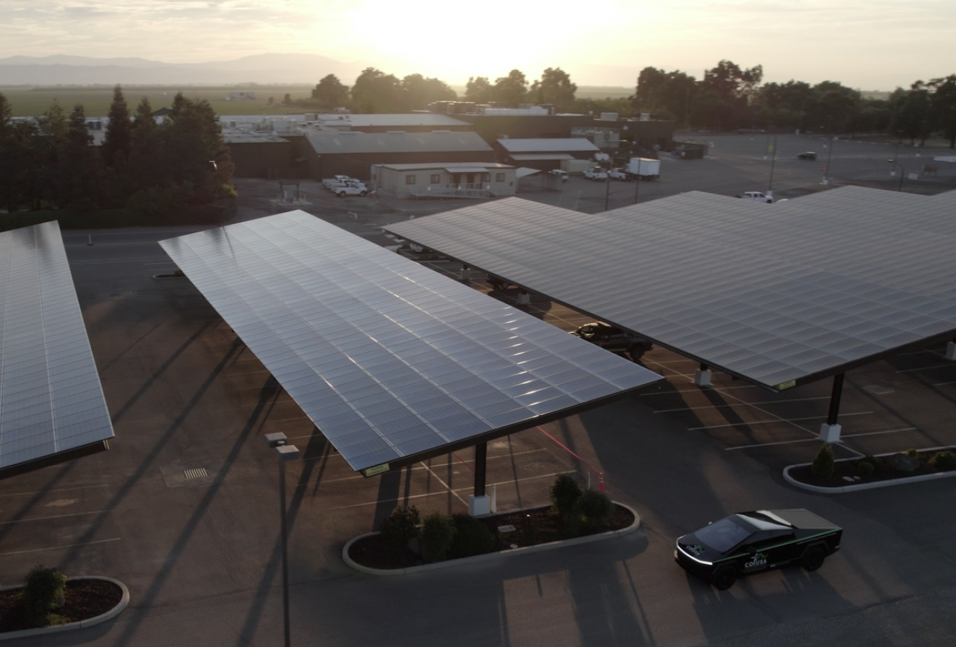 Solar panels over parking lot.