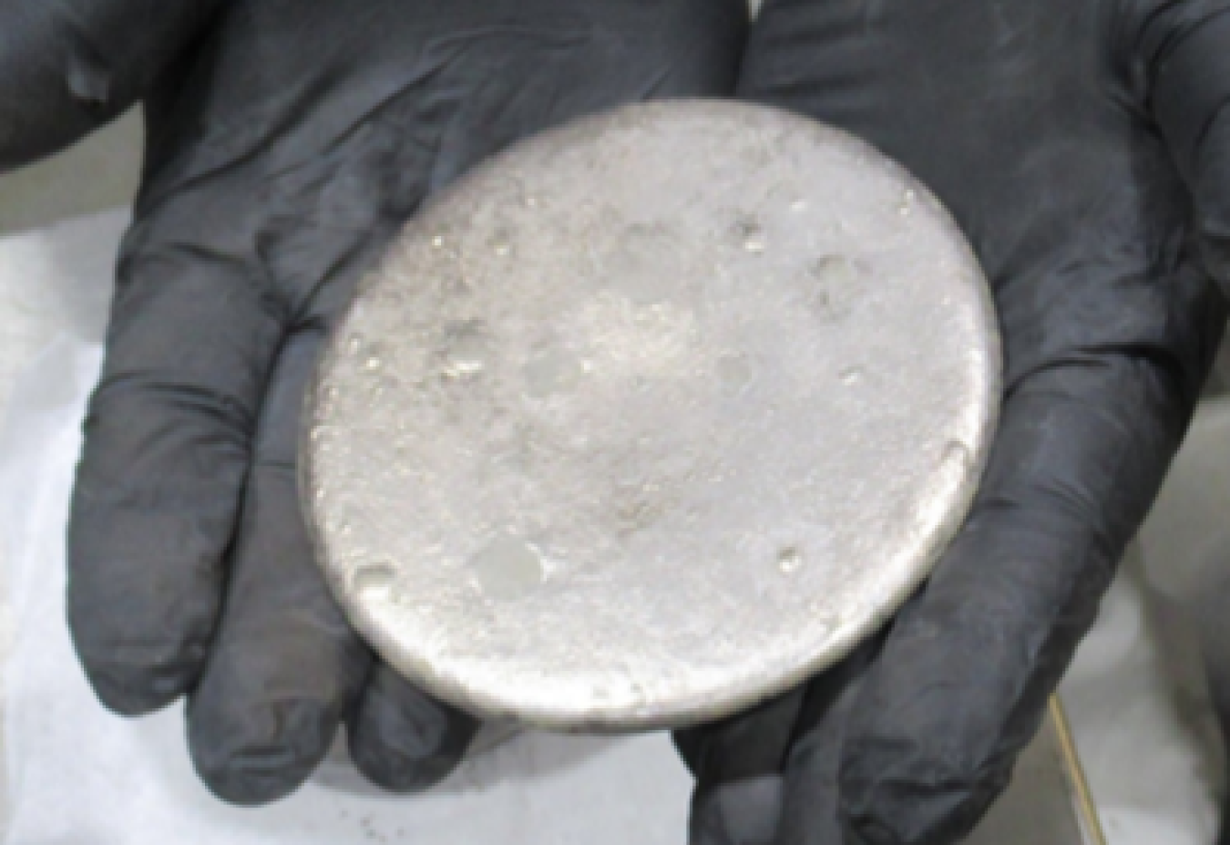 A highly enriched uranium (HEU) metal button