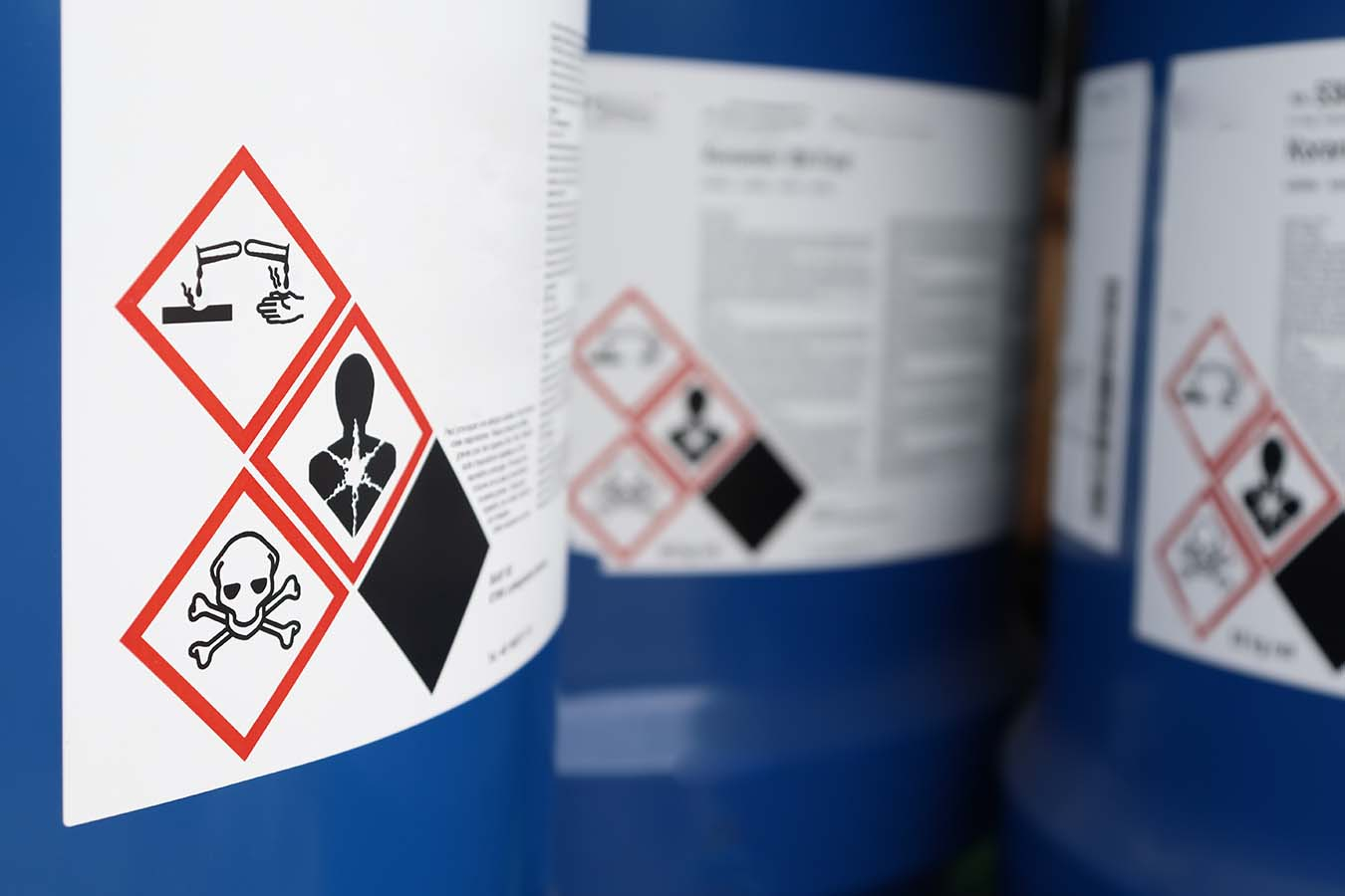 Container with chemical safety icons