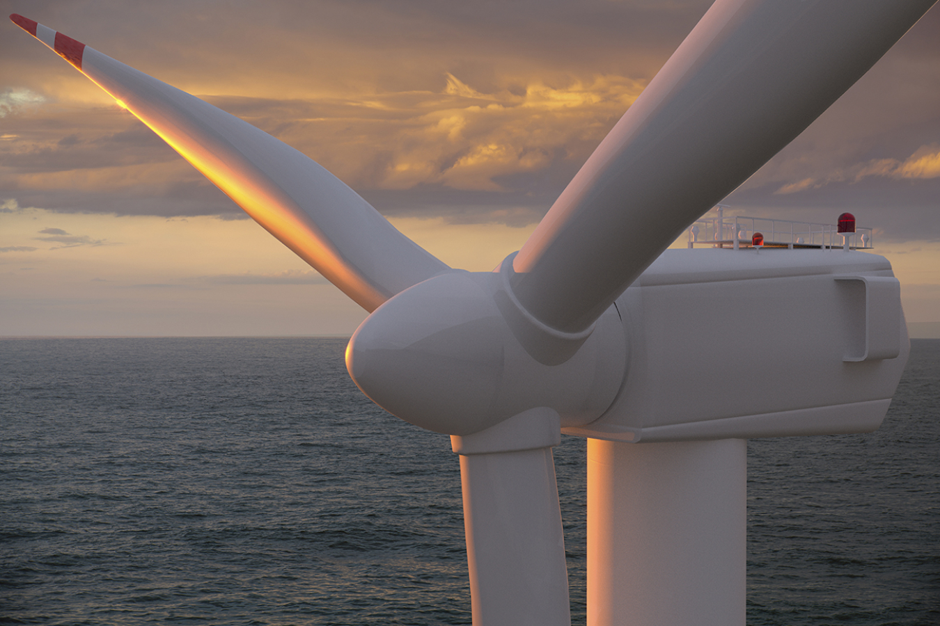 offshore wind turbine at sunset