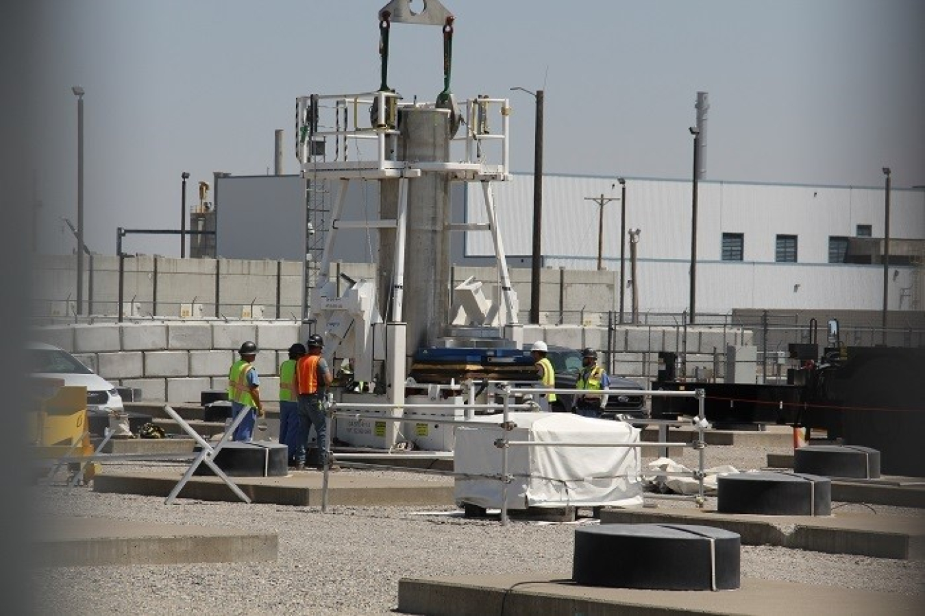 U.S. Department of Energy Office of Environmental Management crews at the Idaho National Laboratory Site prepare to move Peach Bottom Atomic Station fuel from a transfer cask to a second-generation storage vault.