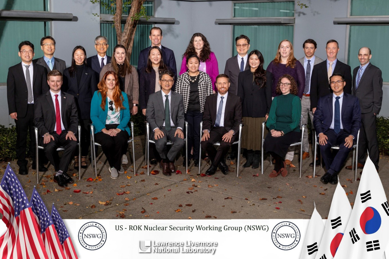 A large group of people pose for a photo. In the corners of the photo are ROK and U.S. flags. At the bottom, it says U.S.-ROK Nuclear Security Working Group (NSWG), Lawrence Livermore National Laboratory.