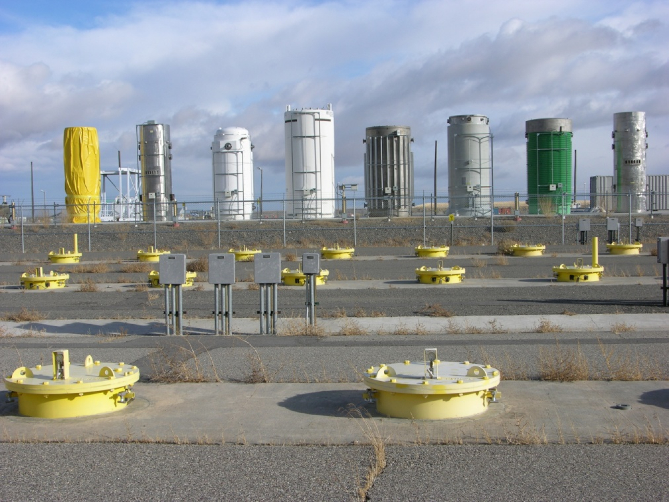 Idaho National Laboratory safely housed dry storage casks and in-ground spent nuclear fuel storage photograph