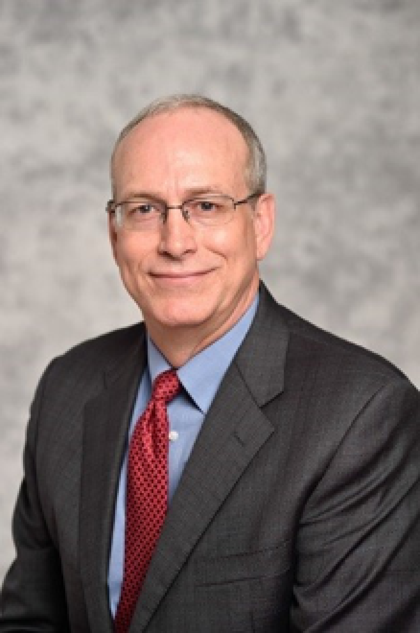 Studio photo / headshot of Andrew Griffith.