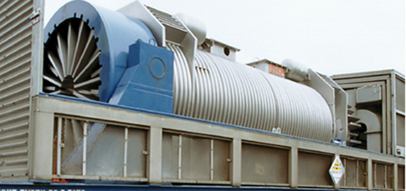 A typical spent nuclear fuel cask sitting on a railcar.