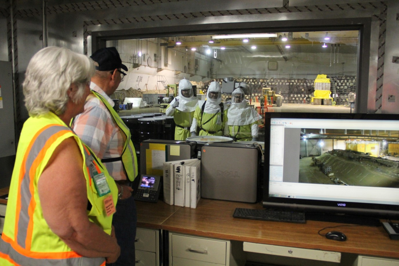 ICP CAB members receive a thumbs up from members of Fluor Idaho's Retrieval Crews, tasked with retrieving the final estimated 1,000 cubic meters of waste.