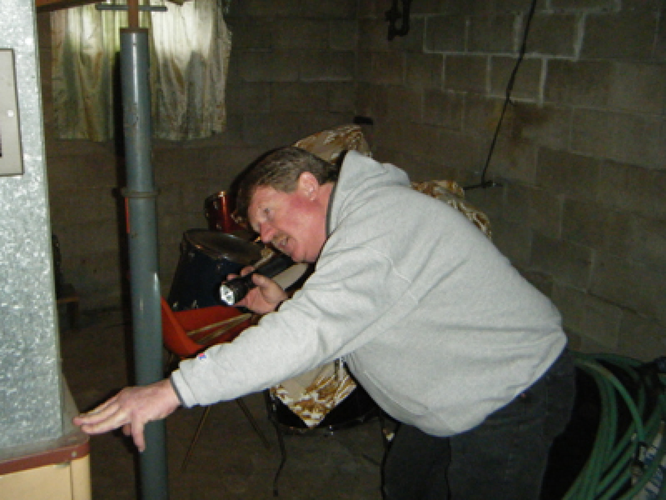 markmorris_inspectingfurnace400x300.jpg